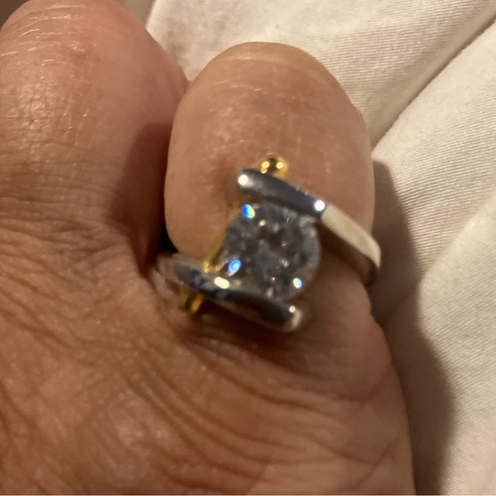 Contemporary AAA quality cubic zirconia, gold and silver ring. New.